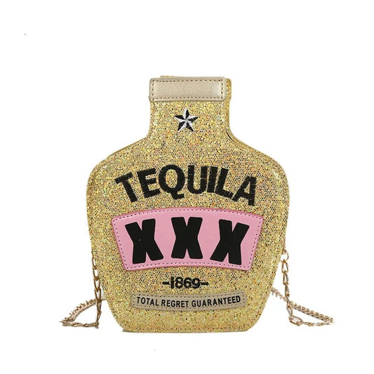 gold crossbody tequila shaped gold crossbody purse with the word tequila in black and XXX 1869 and total regret guaranteed 