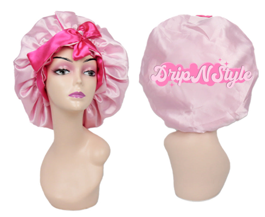 light pink and dark pink satin bonnet with the words dripnstyle